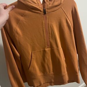 Orange half zip pullover